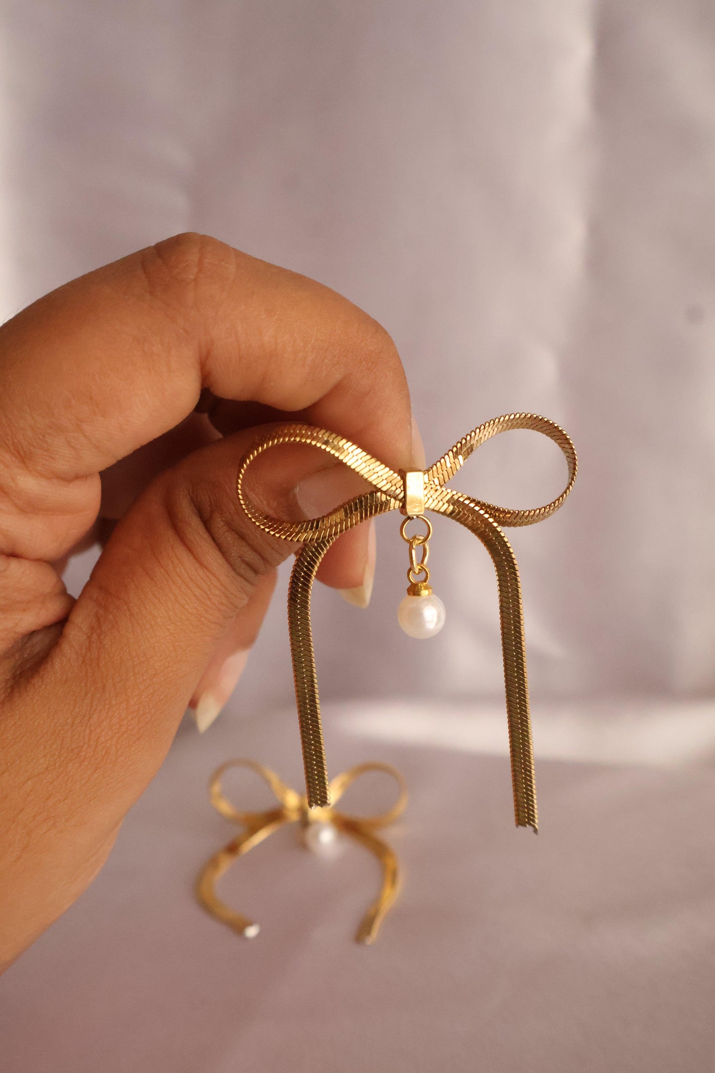 Pearl Bow Statement Earring